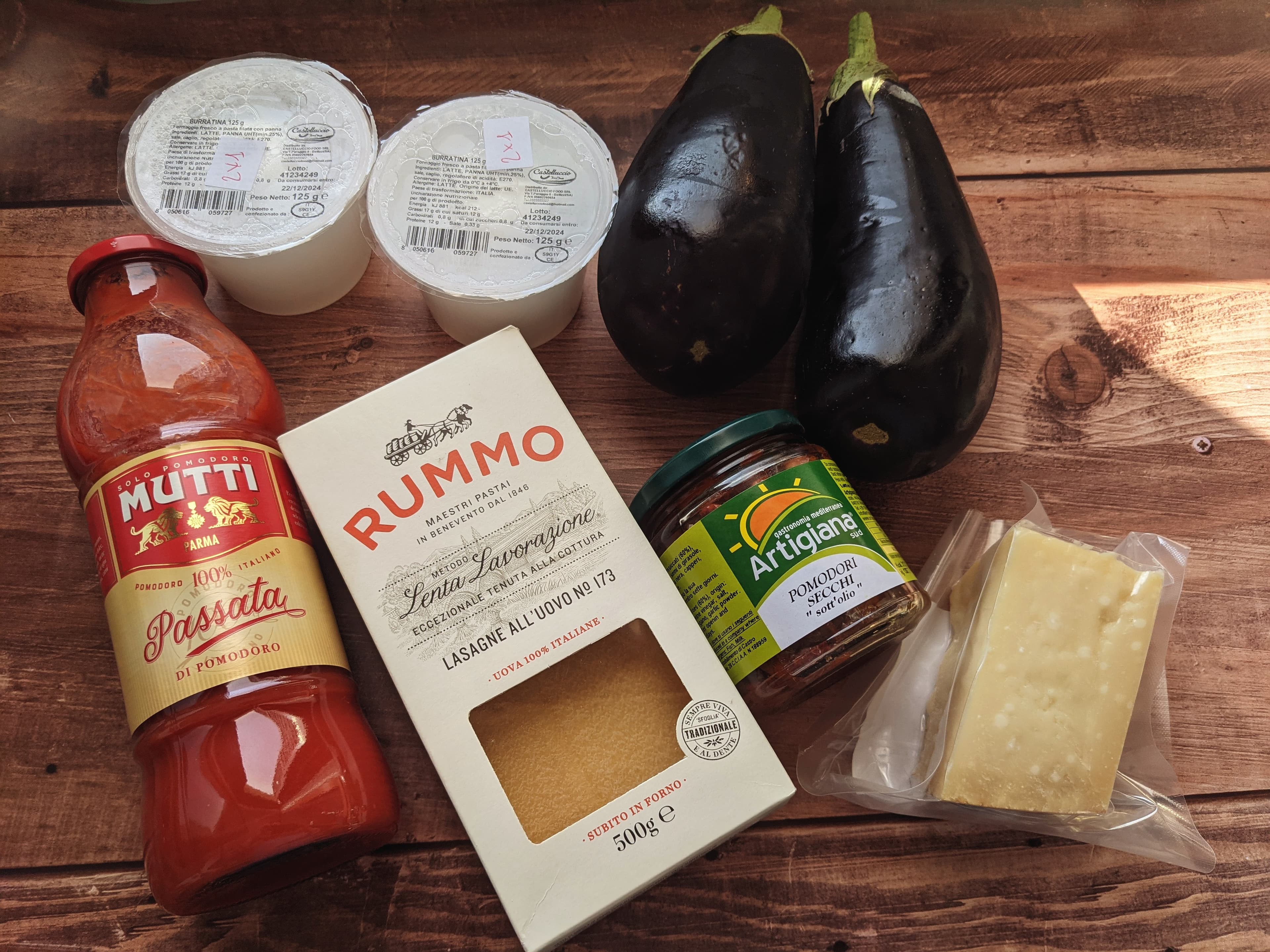 The ingredients of Vegetarian lasagna with eggplants and cheese